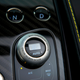 Illustration for article titled This Aston Martin Vanquish Has Elegant Easter Eggs In The Controls